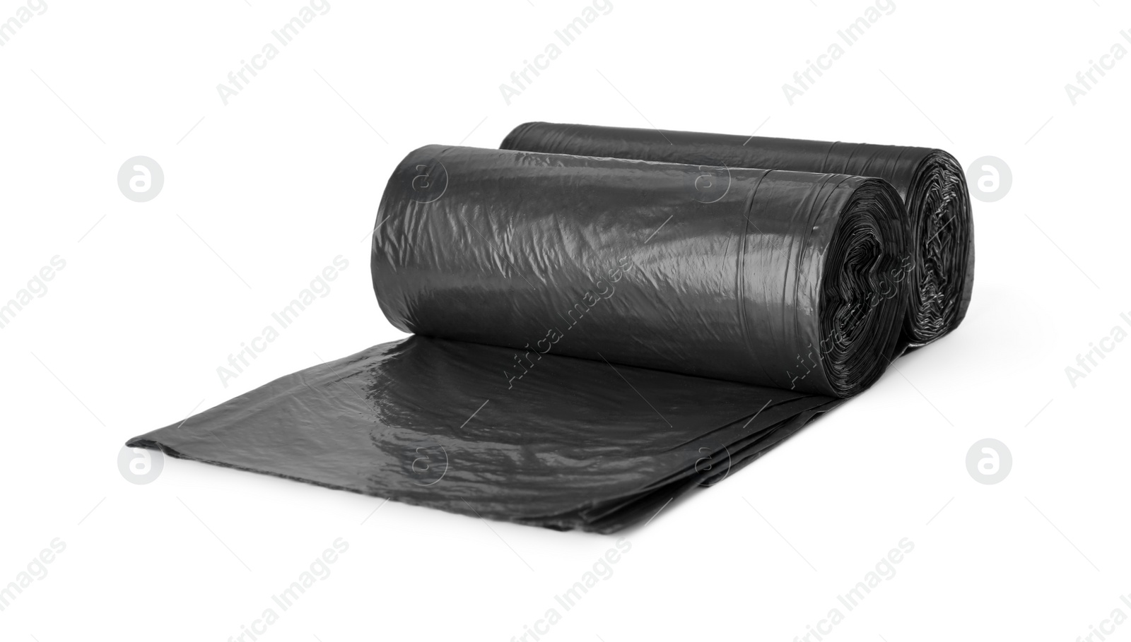 Photo of Rolls of black garbage bags isolated on white