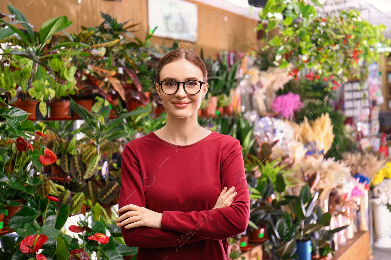 Photo of Portrait of female business owner in flower shop