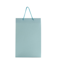 Photo of Light blue paper shopping bag isolated on white