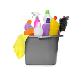 Photo of Bucket with different cleaning products and tools on white background