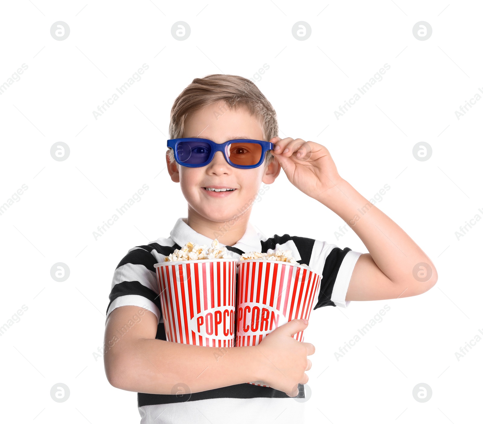 Photo of Cute boy in 3D glasses with popcorn buckets isolated on white