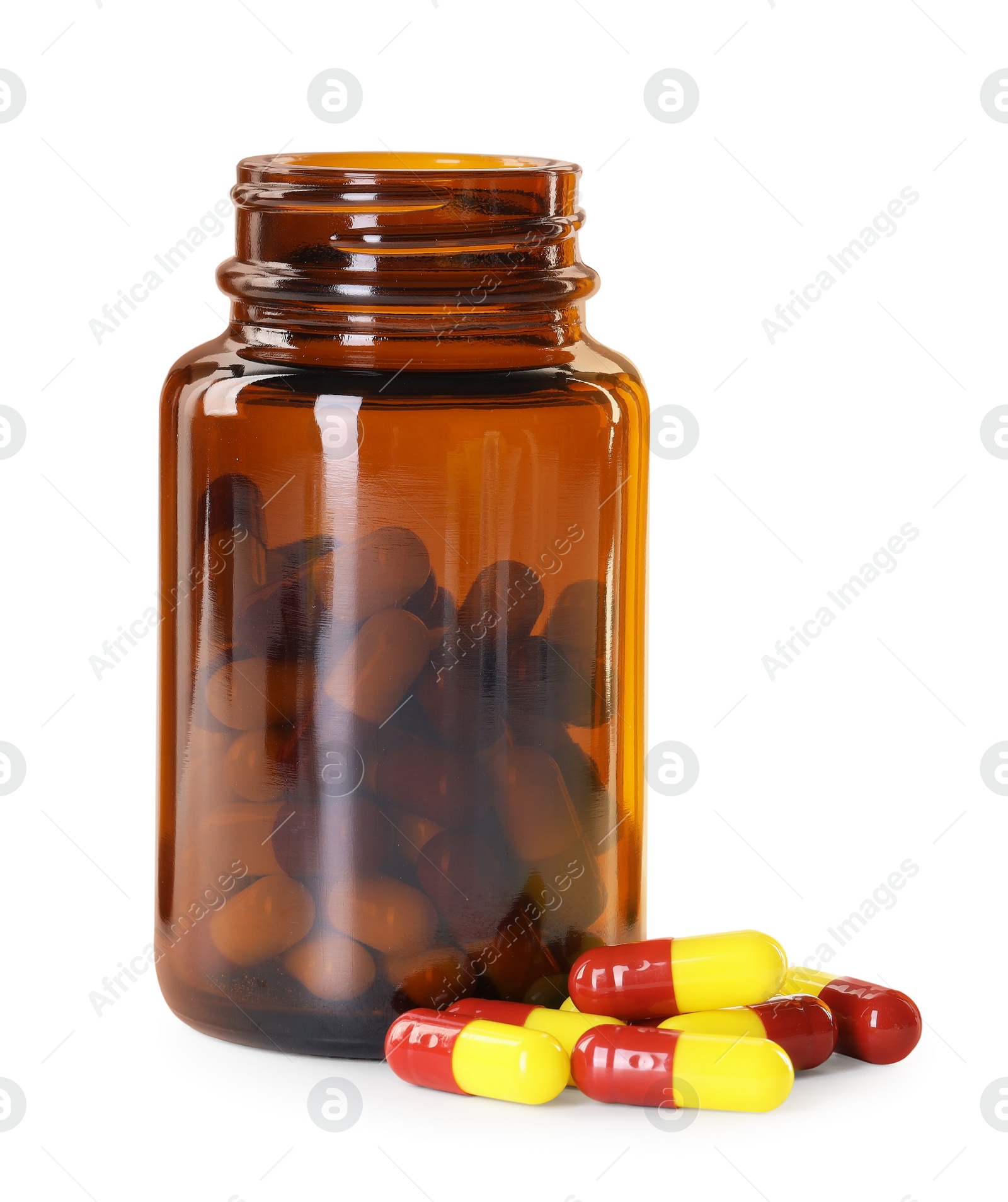 Photo of Antibiotic pills and bottle isolated on white