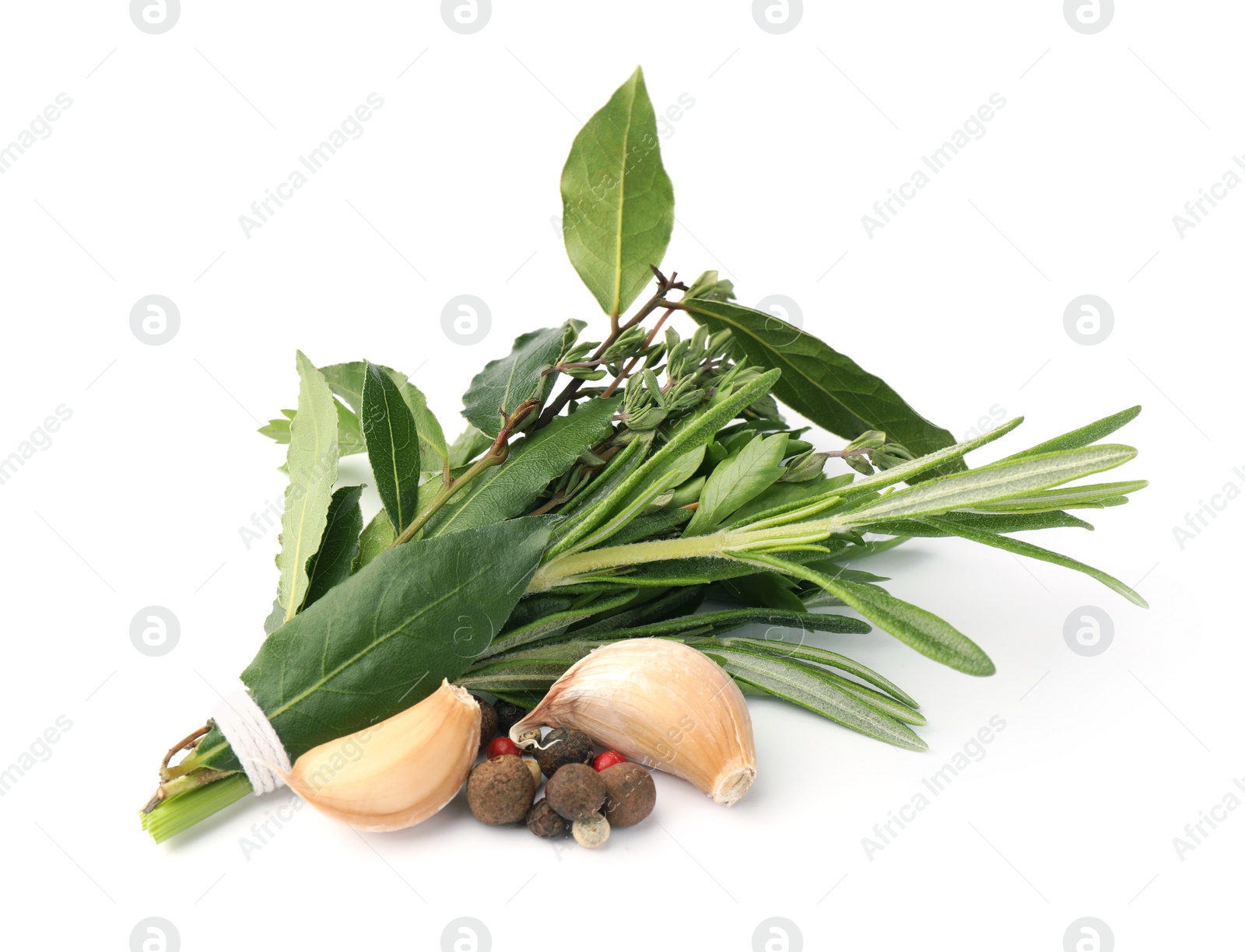 Photo of Bundle of aromatic bay leaves, different herbs and spices isolated on white