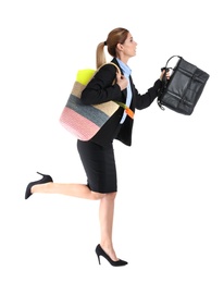 Photo of Businesswoman with briefcase and beach bag running on white background. Combining life and work