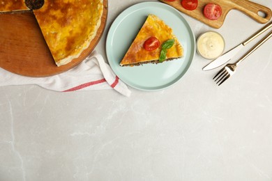 Delicious pie with minced meat, tomato and sauce served on light marble table, flat lay. Space for text