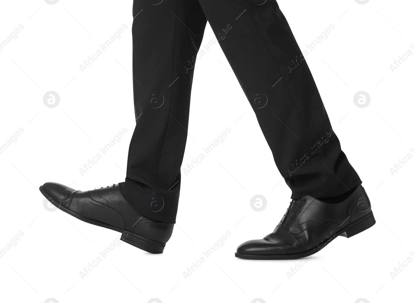 Photo of Businessman in leather shoes on white background, closeup