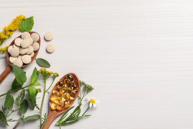 Photo of Different pills, herbs and flowers on white wooden table, flat lay with space for text. Dietary supplements