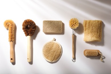 Flat lay composition with eco friendly products on white background