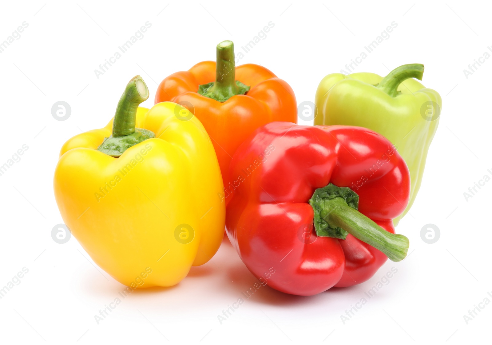 Photo of Fresh ripe bell peppers on white background