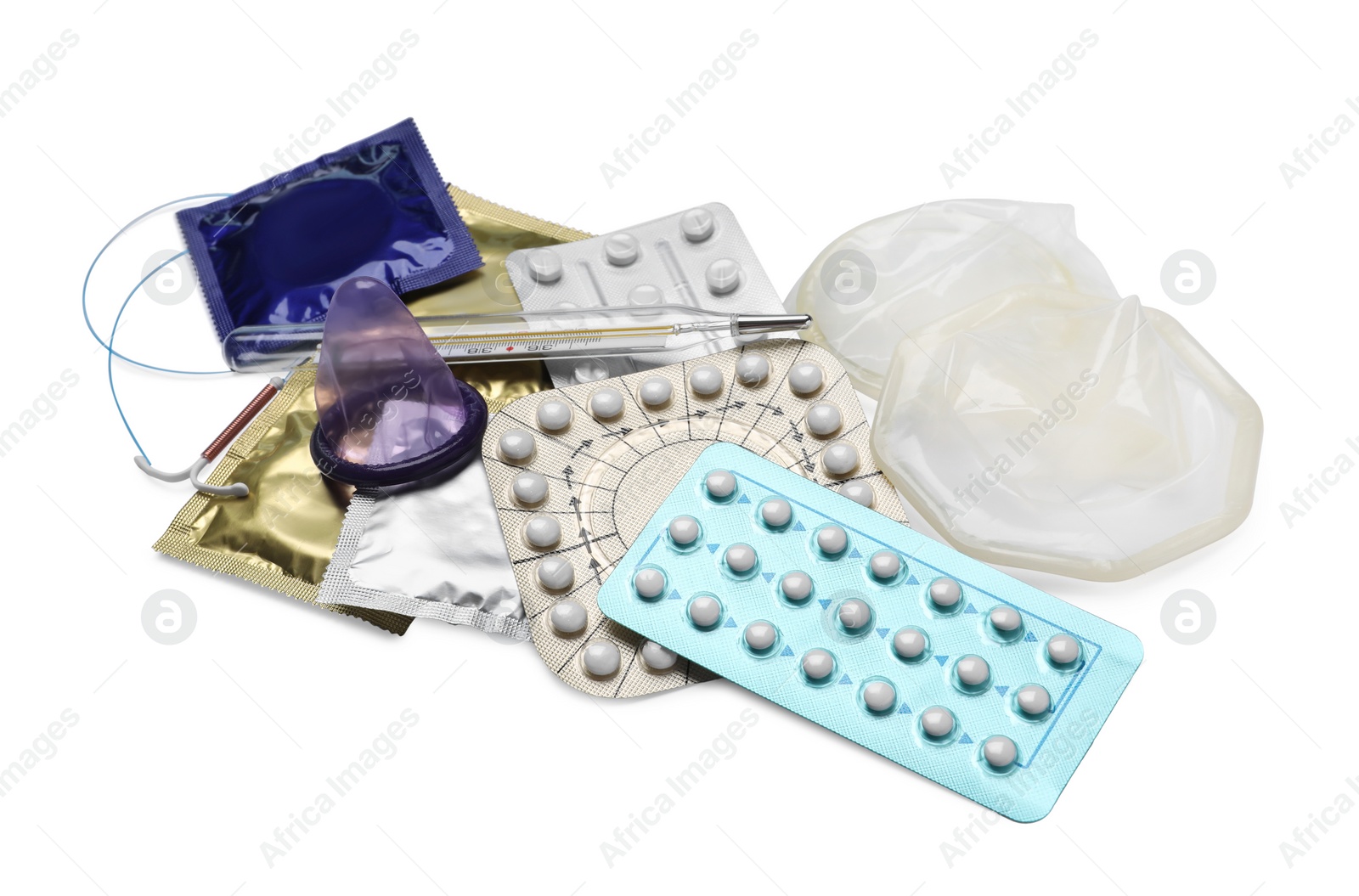 Photo of Contraceptive pills, condoms, intrauterine device and thermometer isolated on white. Different birth control methods