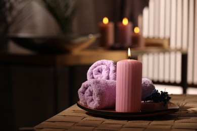 Beautiful composition with different spa products on wicker bench indoors, space for text