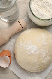 Photo of Cooking scones with soda water. Dough and ingredients on white wooden table, flat lay