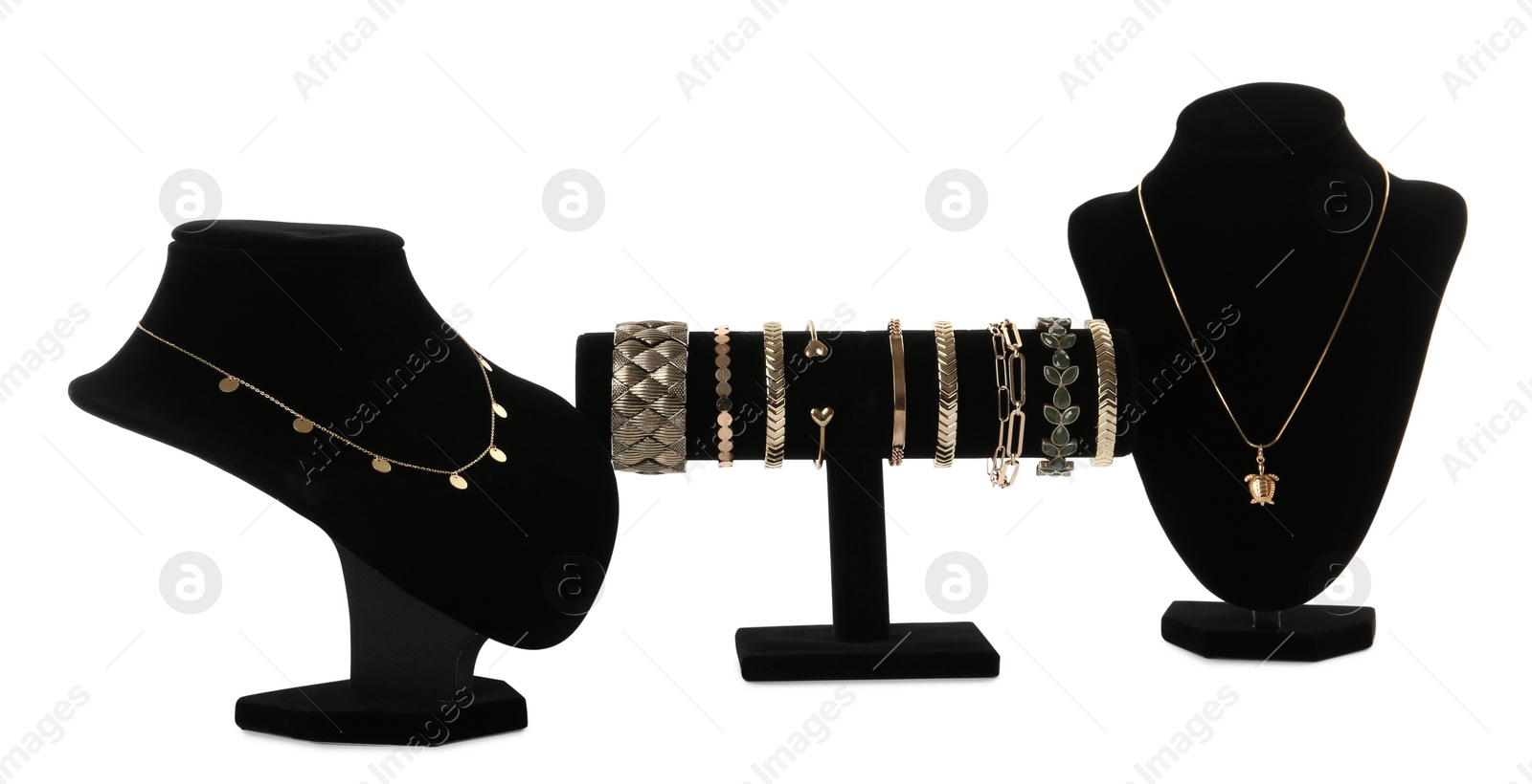 Photo of Different display stands with stylish jewelry on white background