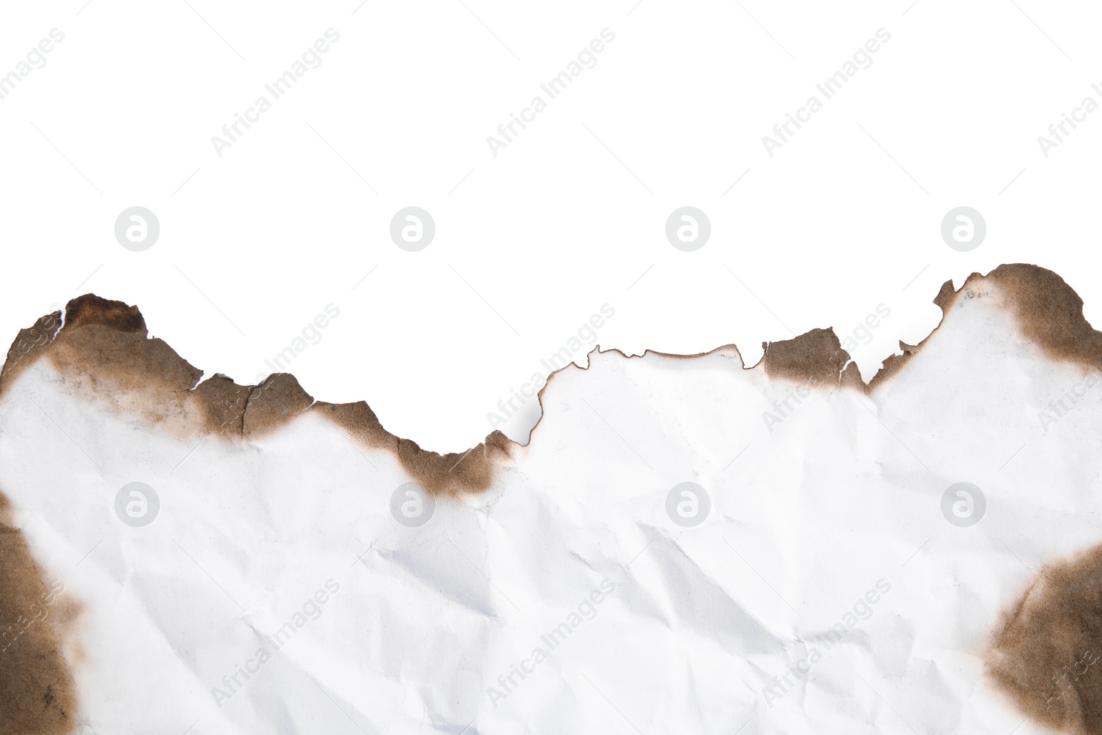 Photo of Piece of paper with dark burnt borders on white background, top view. Space for text