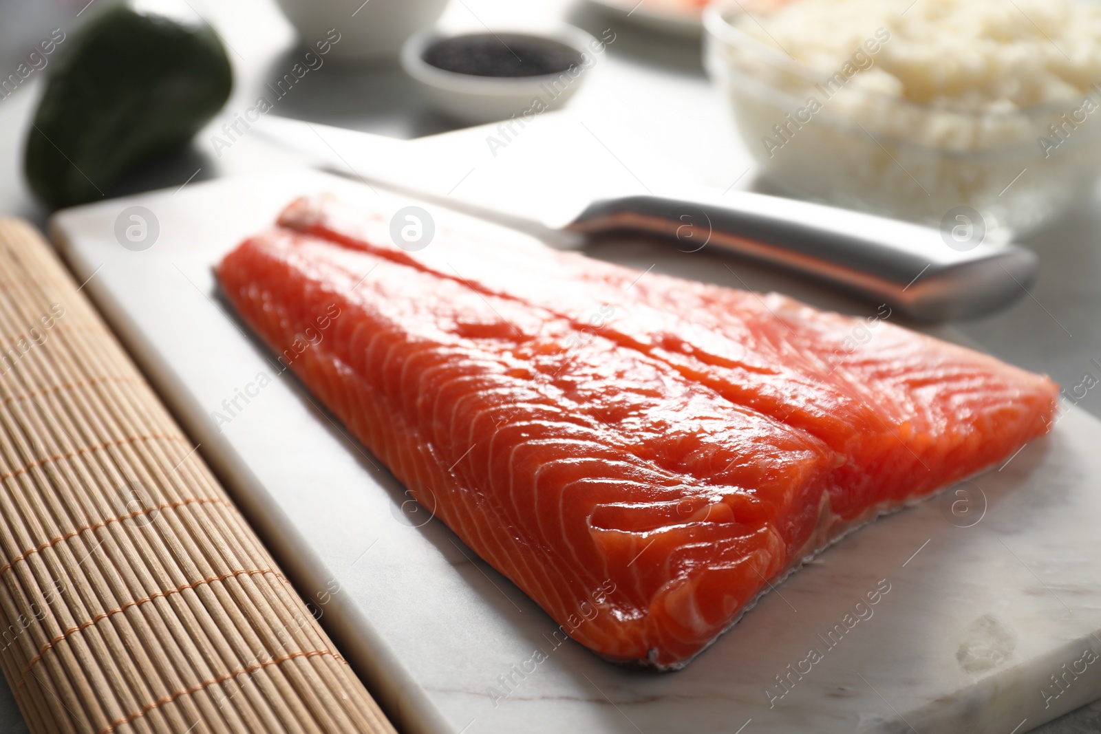 Photo of Fresh salmon for sushi on table, closeup