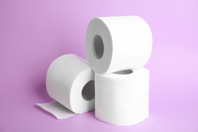 Photo of Toilet paper rolls on color background. Personal hygiene