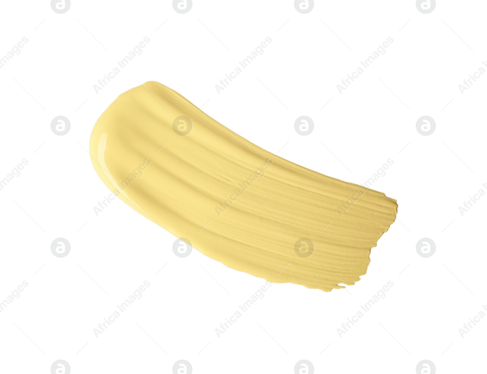 Photo of Stroke of yellow color correcting concealer isolated on white