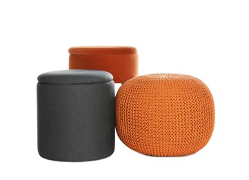 Photo of Different poufs on white background. Home design