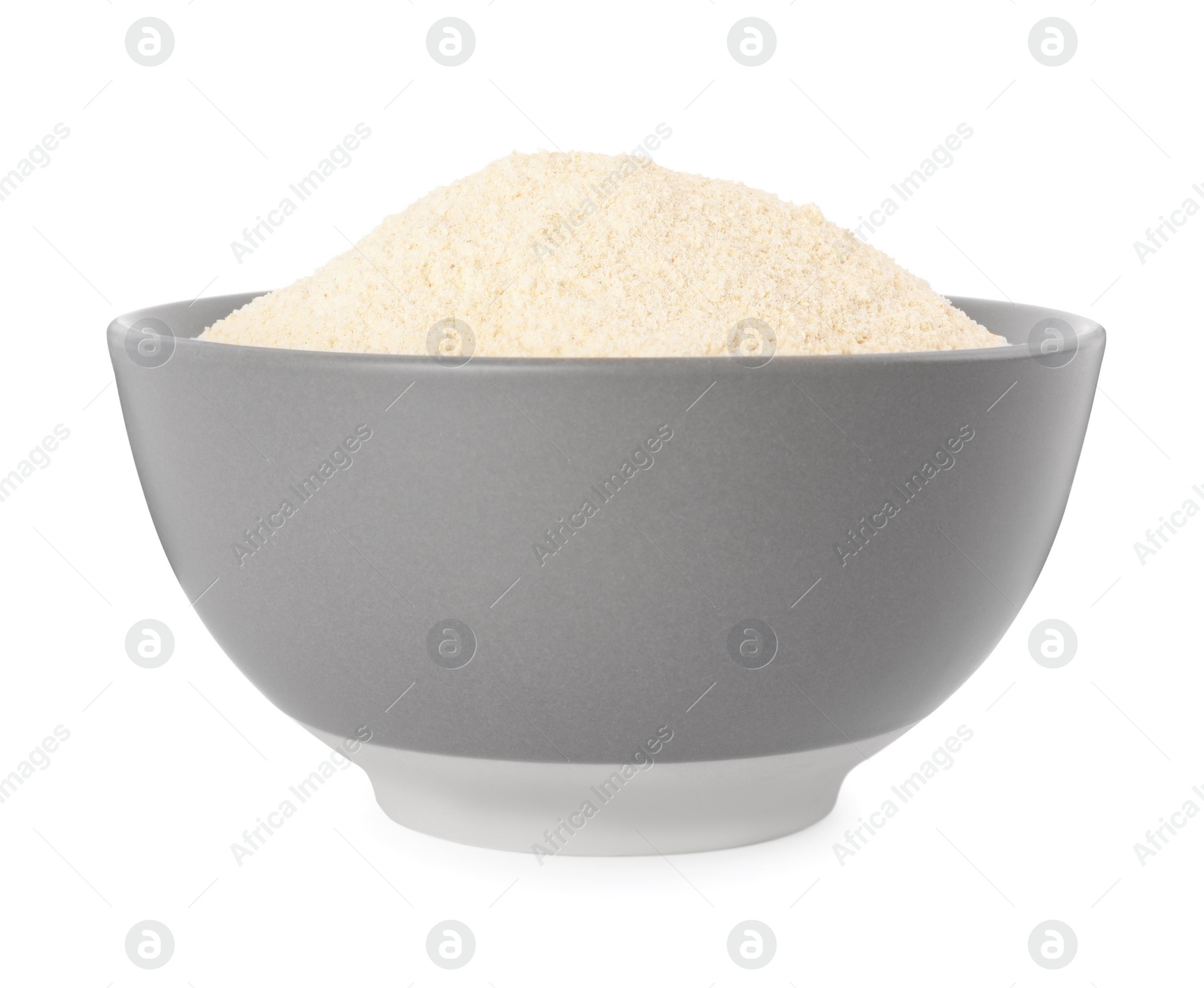 Photo of Ceramic bowl with quinoa flour on white background