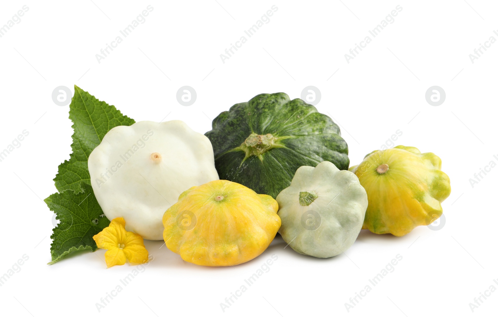 Photo of Fresh ripe pattypan squashes with leaves and flower on white background