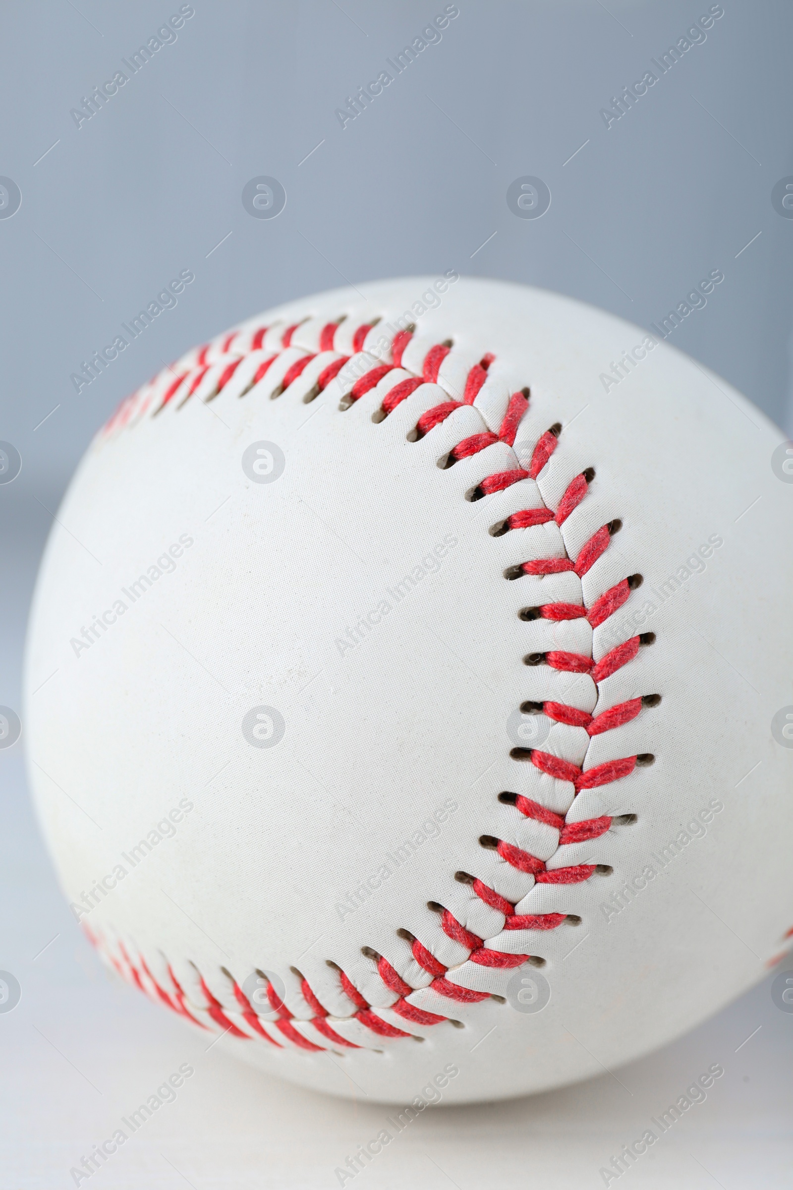 Photo of Closeup view of baseball ball. Sportive equipment