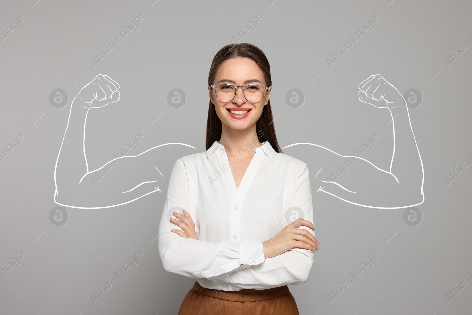 Image of Confident woman on grey background. Illustration of muscular arms behind her