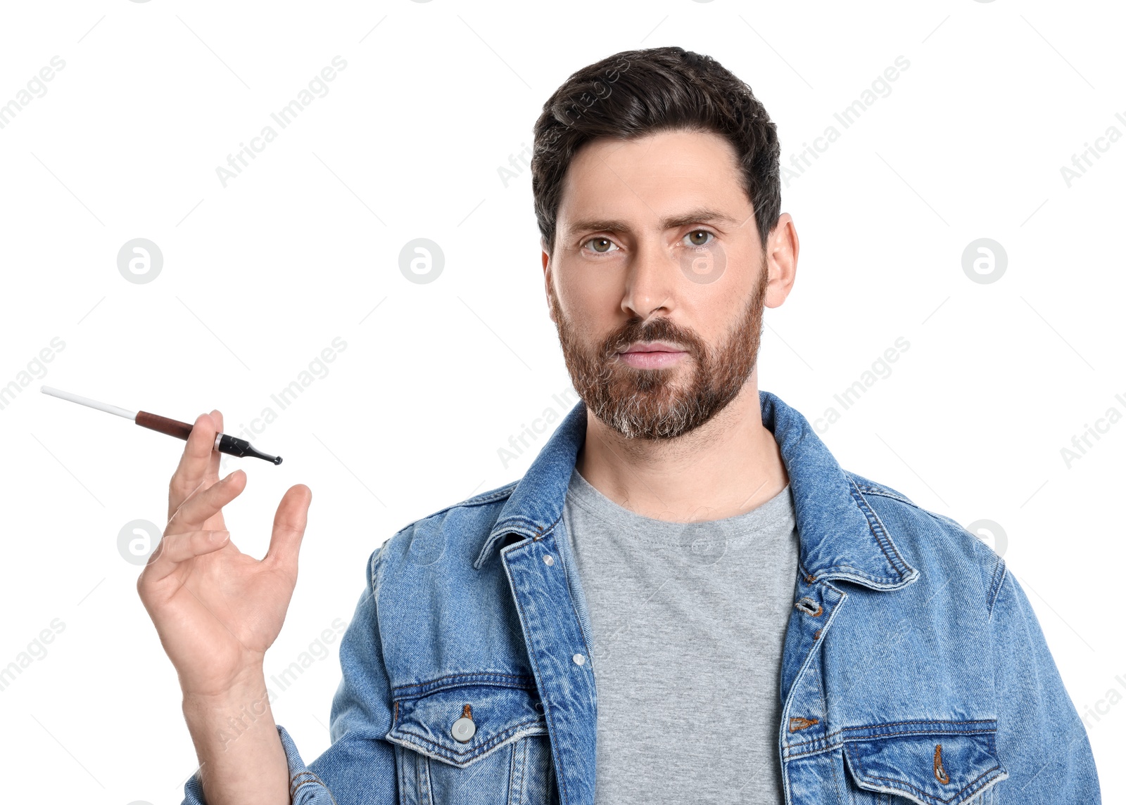 Photo of Man using cigarette holder for smoking isolated on white