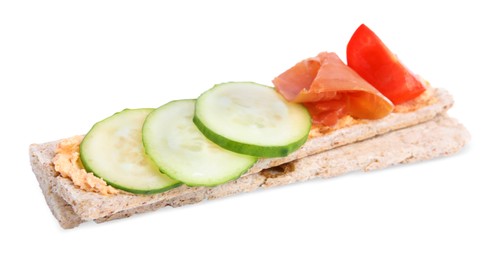 Photo of Tasty crispbreads with prosciutto, cream cheese and vegetables isolated on white