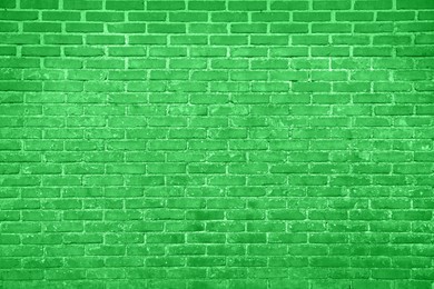 Texture of light green brick wall as background