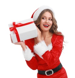 Beautiful Santa girl with Christmas gift on white background