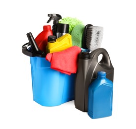 Photo of Light blue bucket and many different car wash products on white background