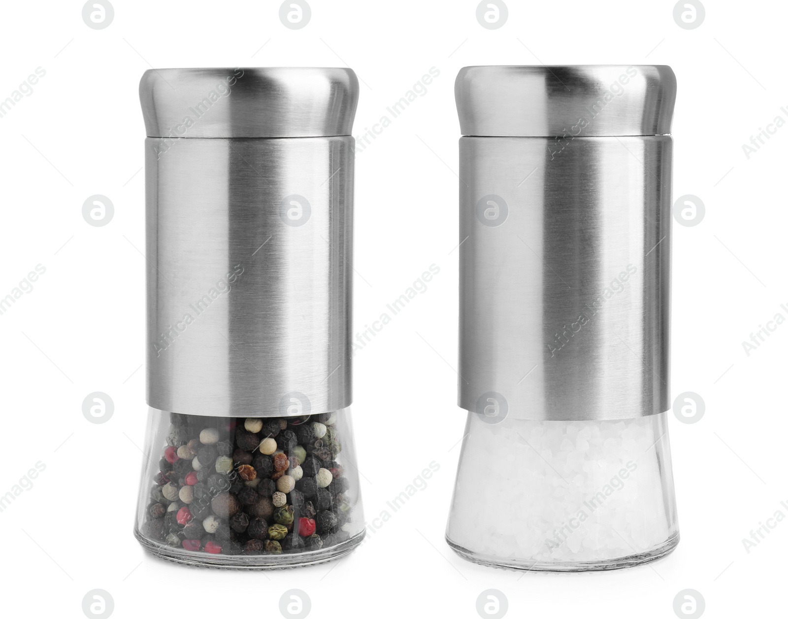 Image of Salt shaker and pepper mill isolated on white