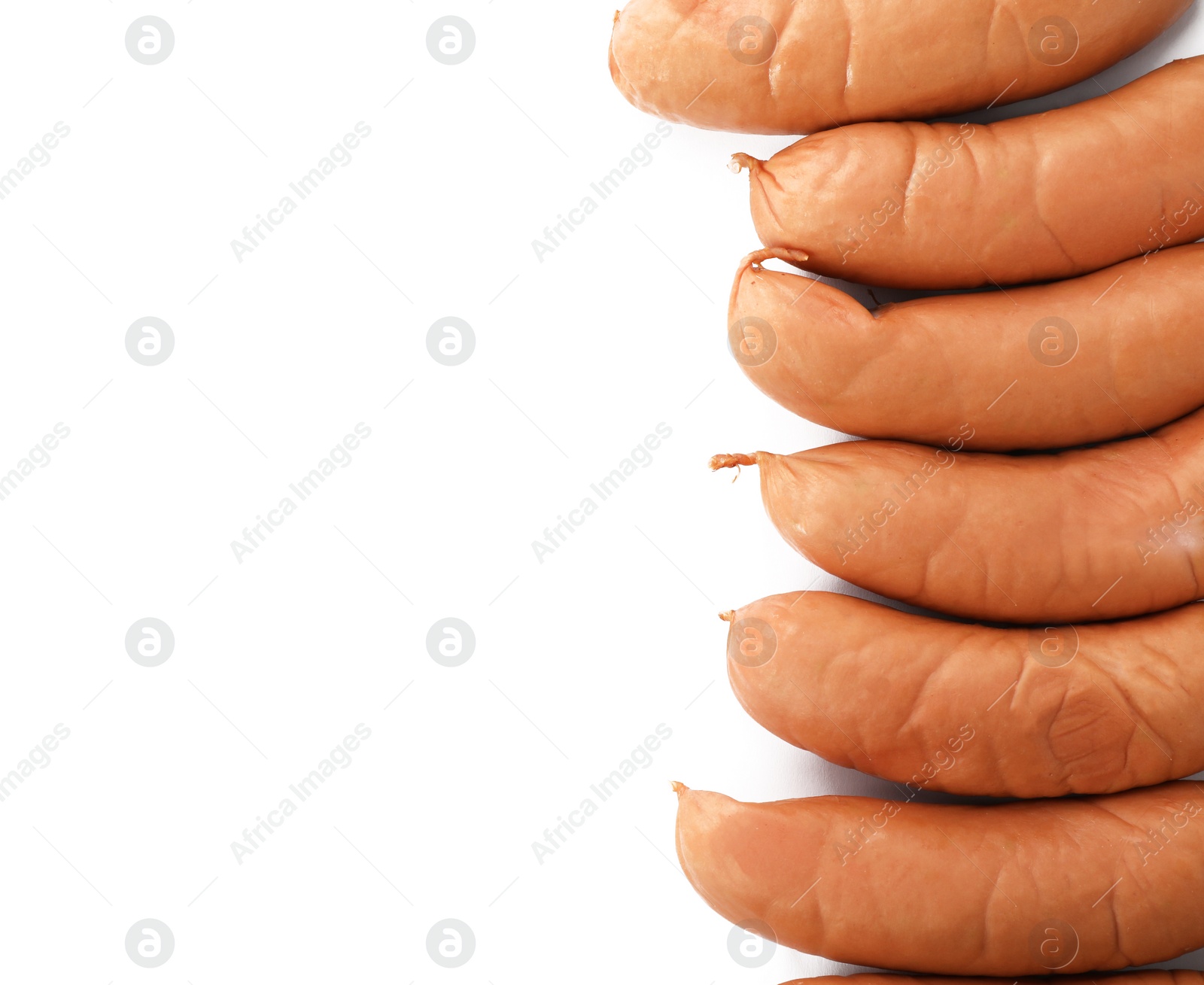 Photo of Tasty sausages on white background, top view with space for text. Meat product