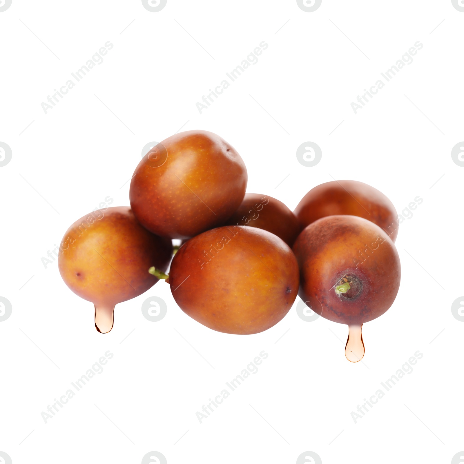 Image of Oil dripping from palm fruits on white background