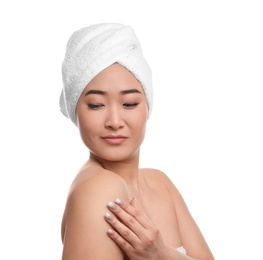 Photo of Portrait of beautiful Asian woman with towel on head against white background. Spa treatment