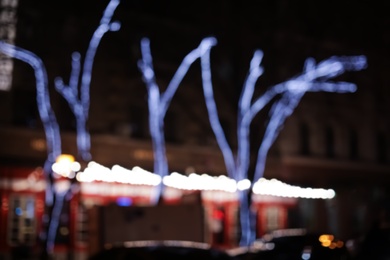 Photo of Beautiful street lights at night. Bokeh effect