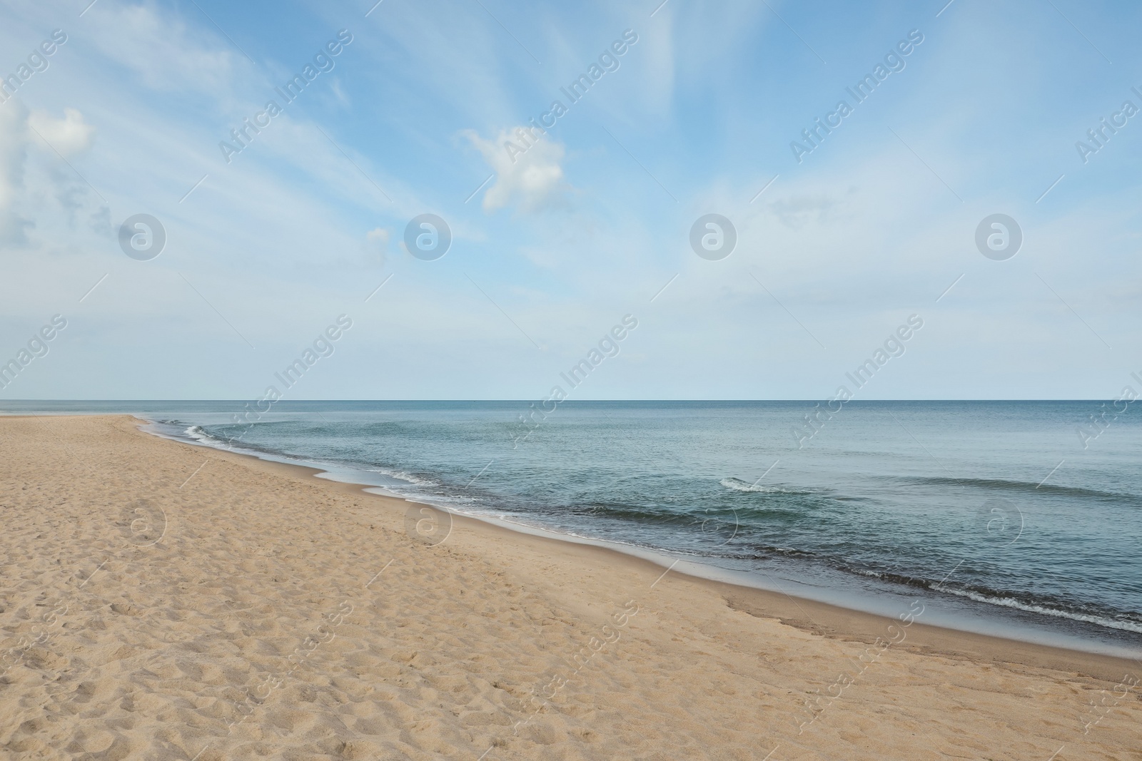 Photo of Beautiful view of sea shore and blue sky on sunny day