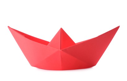 Photo of Handmade red paper boat isolated on white. Origami art