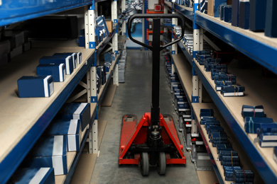 Photo of Modern wholesale shop interior with pallet jack