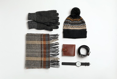 Photo of Flat lay composition with male winter clothes on white background