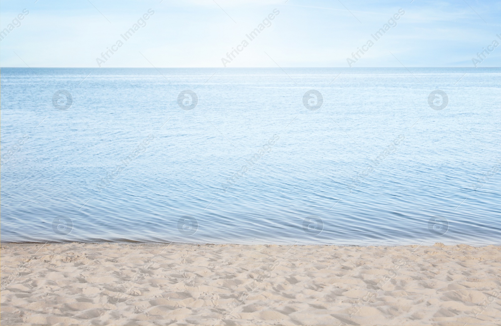 Photo of Sandy beach near sea on sunny summer day