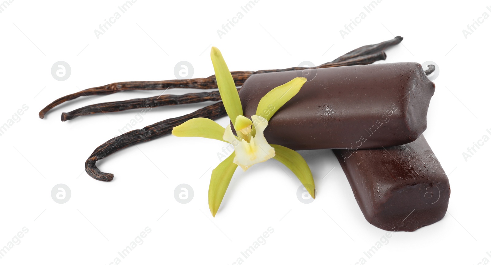 Photo of Glazed curd cheese bars, vanilla pods and flower isolated on white