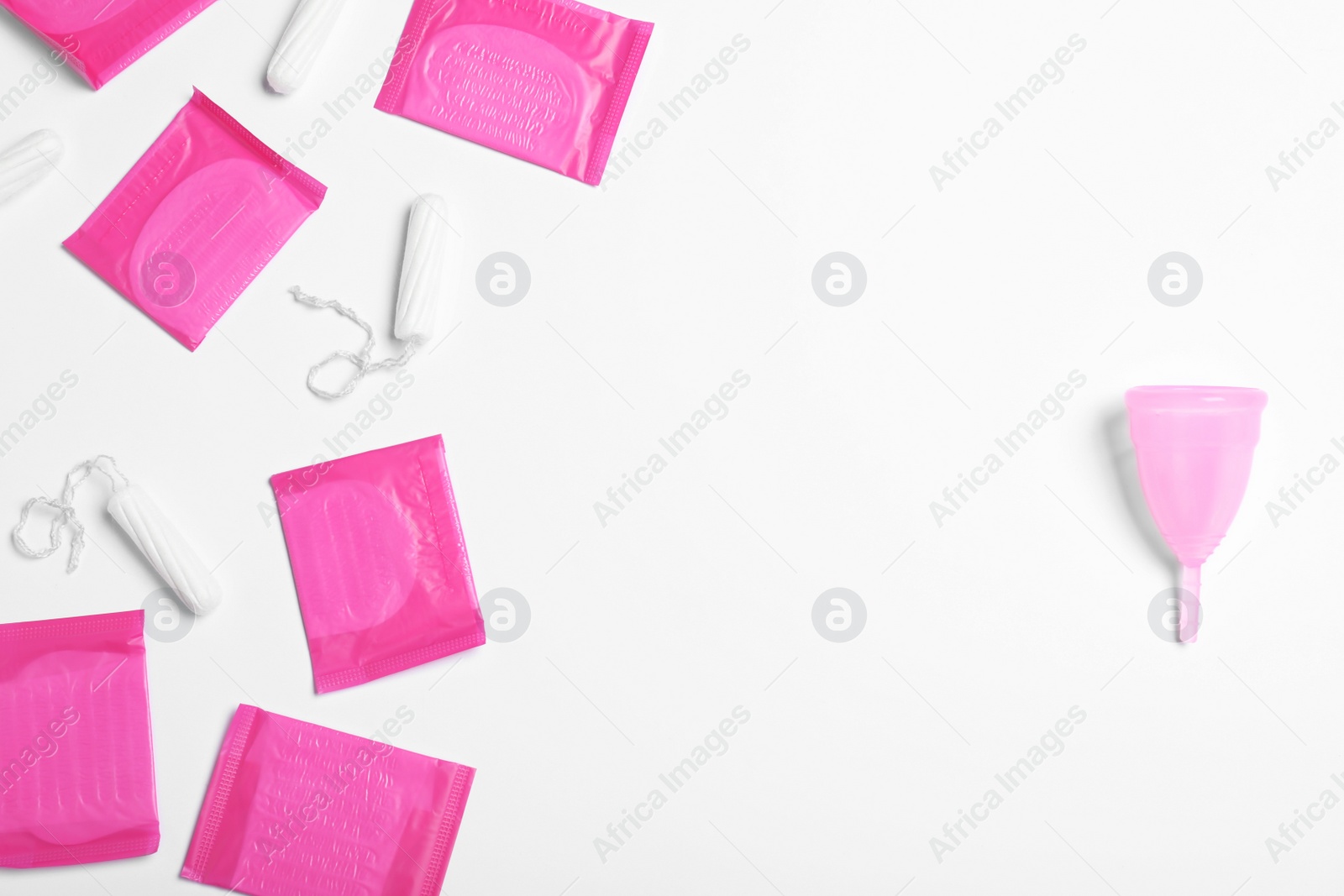 Photo of Different feminine hygiene products on white background, top view. Recycling concept