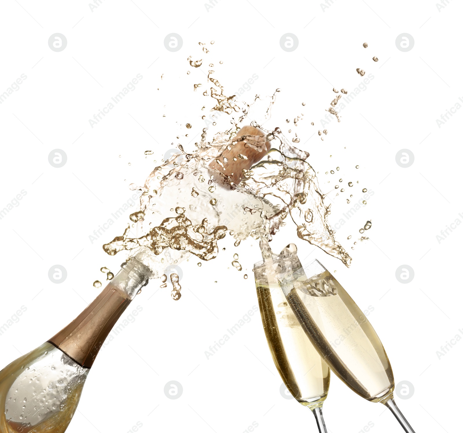 Image of Sparkling wine splashing out of bottle and glasses on white background