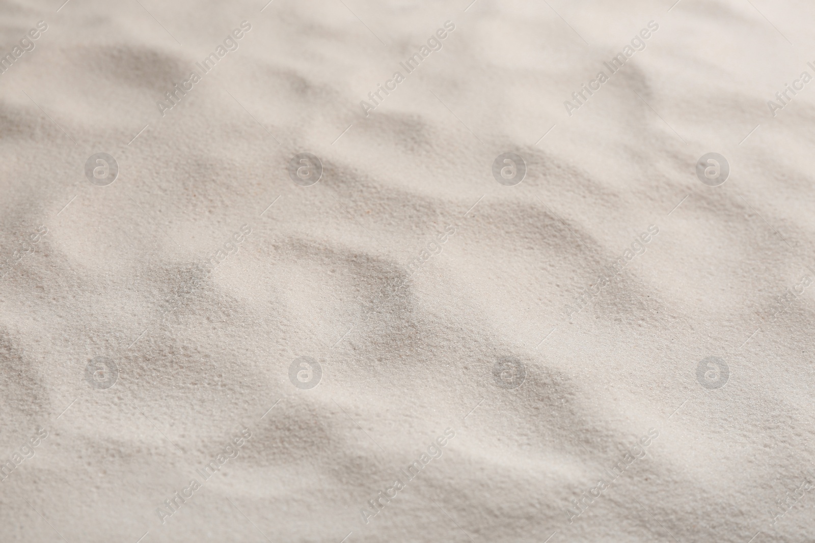 Photo of Dry beach sand as background, top view