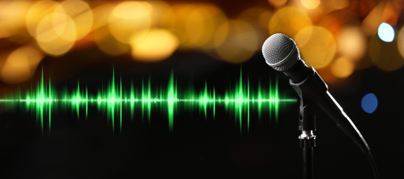 Image of Microphone and radio wave on dark background, bokeh effect. Banner design