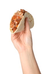Photo of Woman holding delicious taco with meat on white background, closeup