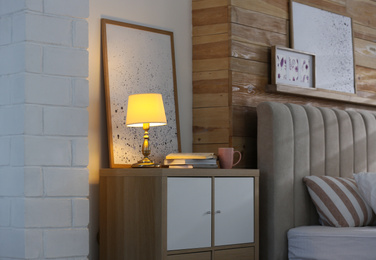 Photo of Modern cabinet in beautiful bedroom. Interior design