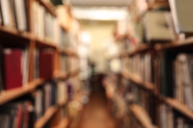 Blurred view of cabinets with books in library