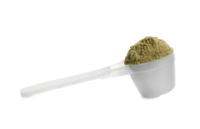 Scoop with hemp protein powder on white background